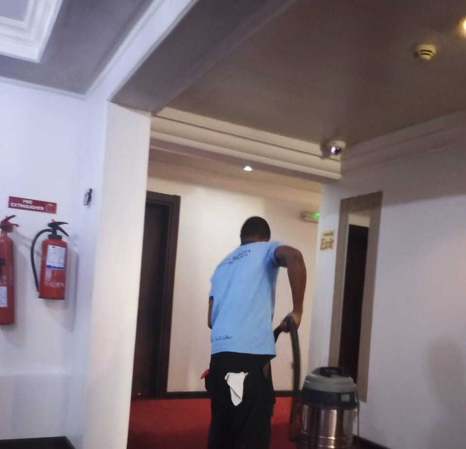 Pulito Sparkles team member cleaning a commercial property